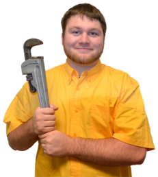 Plumber in Cedar Hill poses with a wrench